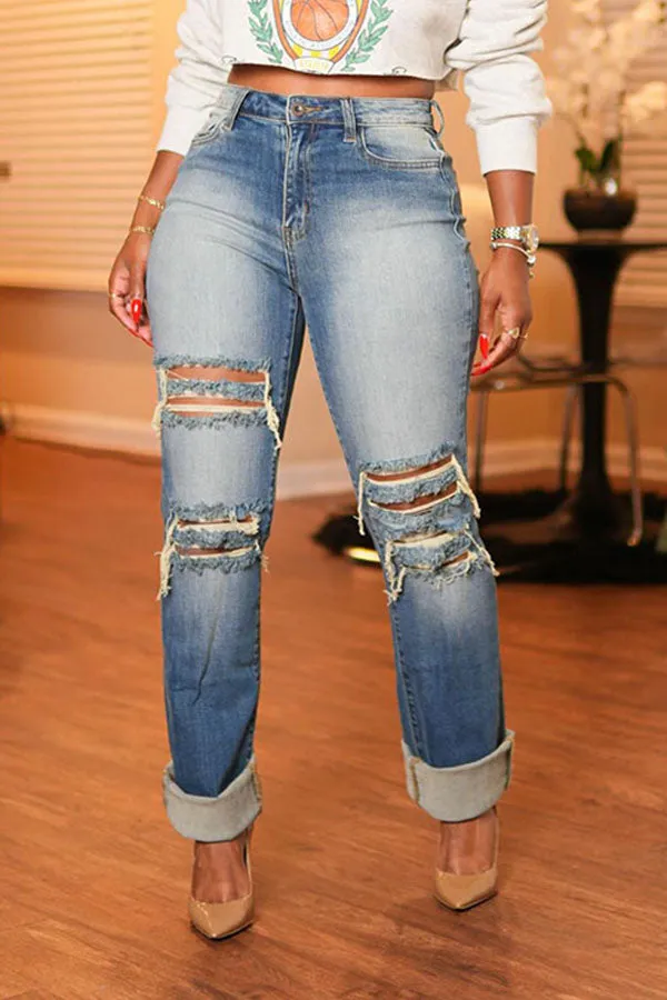 Vintage Ripped Raw Trim Light Wash Jeans